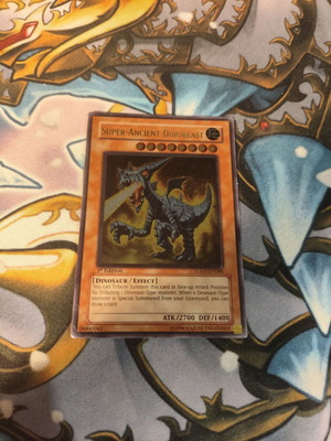 Super-Ancient Dinobeast Yu-Gi-Oh! card 1st edition used, damaged, ultimate rare
