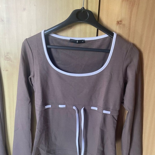 My Museclo set like new, size Small, brown