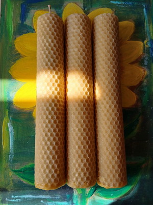 Beeswax candles with aroma oils and herbs