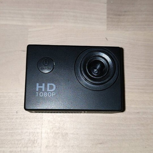 Action camera like new with waterproof case and mounting accessories