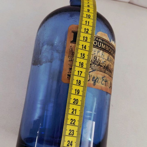 Vintage blue glass bottle used from the 1960s