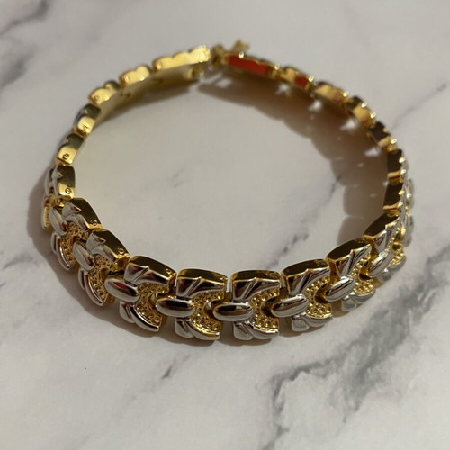 Bracelet in gold and silver colors like new