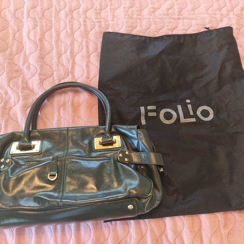 Folio leather women's handbag like new, dark green bowling style