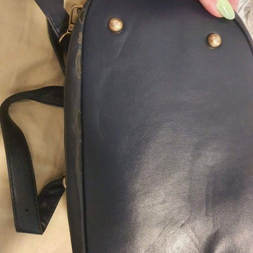 Doca backpack used, blue and gold with multiple compartments