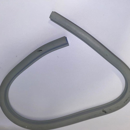 Vintage flexible curve used for technical drawing, metal drafting tool