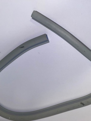 Vintage flexible curve used for technical drawing, metal drafting tool