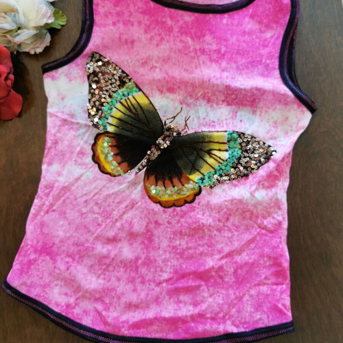 Women's pink polyester top with butterfly, size M