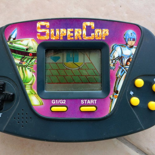 Super Cop Neda handheld electronic game used
