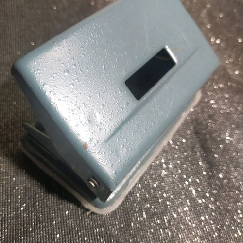 Hole punch used, gray