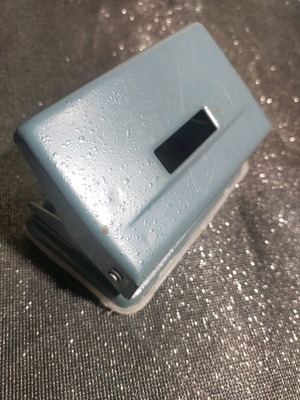 Hole punch used, gray
