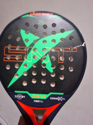 Padel racket used, moderate condition with small cracks