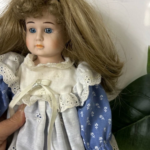 Porcelain doll Germany from the 70s like new