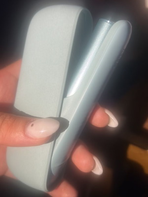 Iqos electronic cigarette with charging cable