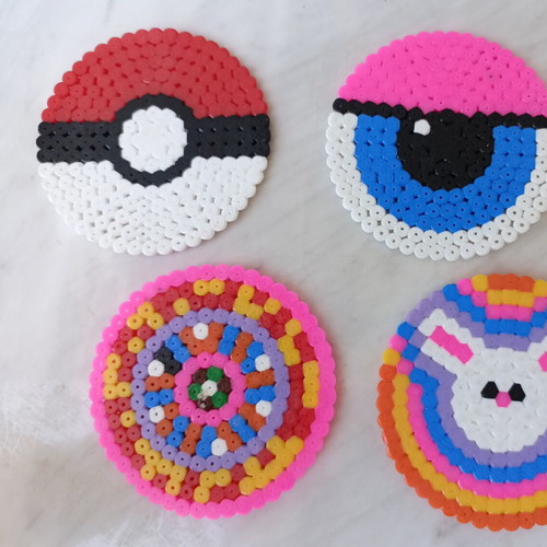 Set of 4 handmade fuse-bead coasters with colorful pixel designs