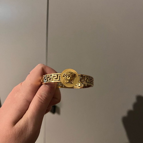 Versace gold hand bracelet like new