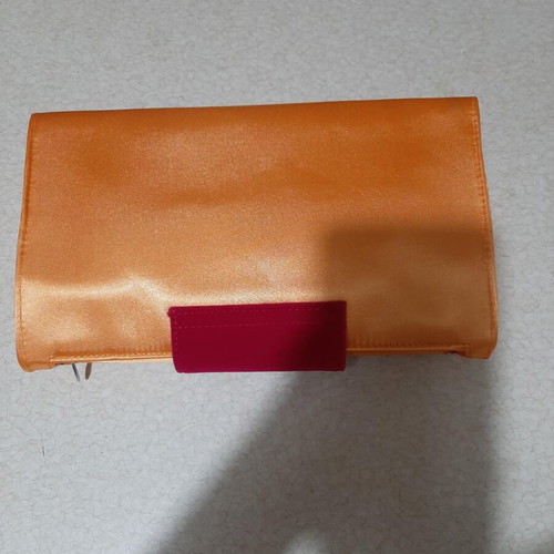Yves Saint Laurent clutch bag new, vintage, orange