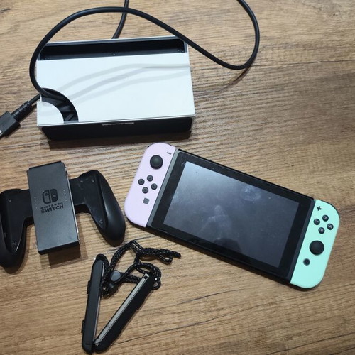 Nintendo Switch console with accessories, original controllers