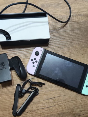 Nintendo Switch console with accessories, original controllers