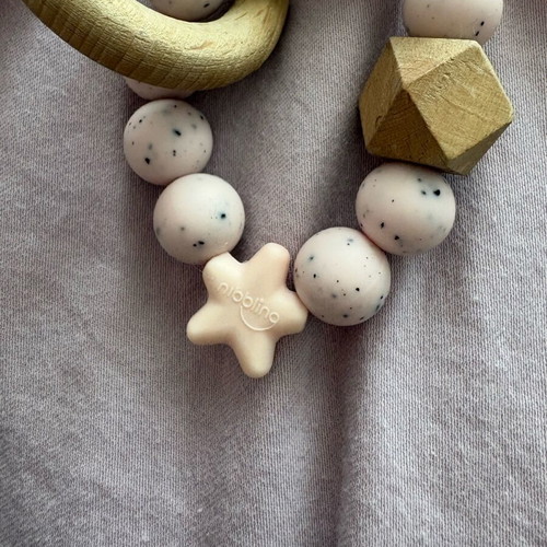 Baby silicone teething set, pacifier holder and training cup used