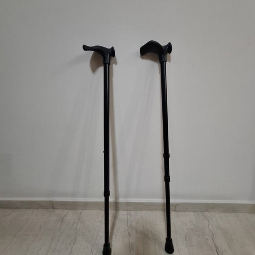 Orthopedic Walking Canes like new with adjustable height and ergonomic handle