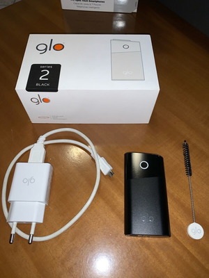 Устройство Glo Series 2 Black употребявано с четка, зарядно и кутия