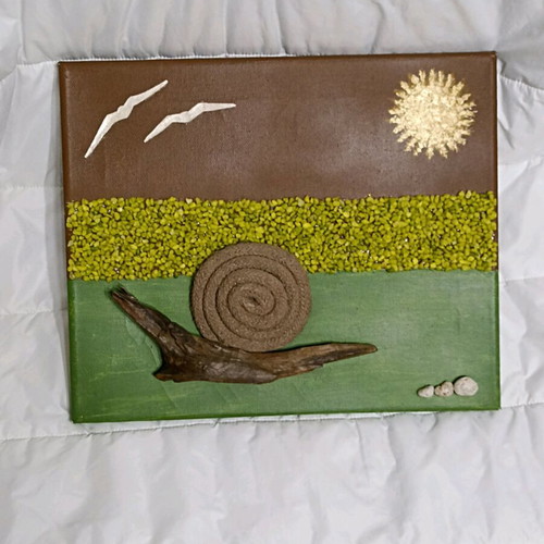 Handmade canvas art with snail and decorative stones