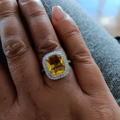 Ring new with large central yellow zircon and white zircons