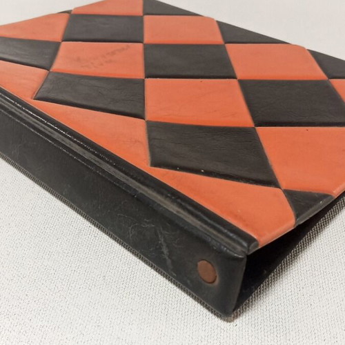Vintage photo album used, orange and black checkered