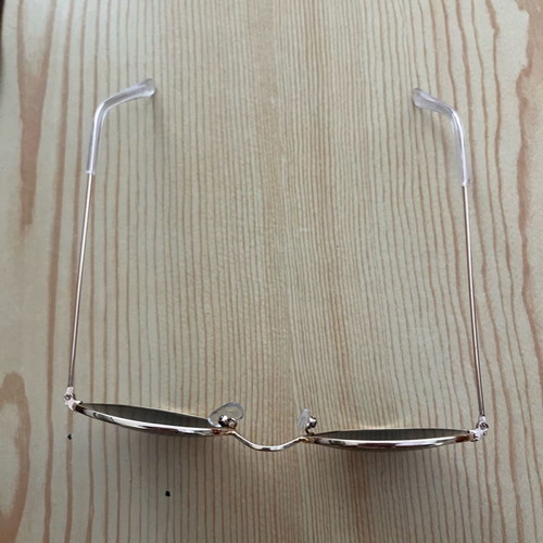Round sunglasses with blue lens and UV protection