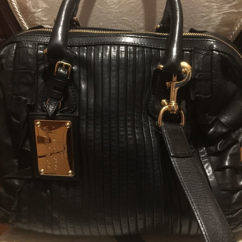 Dolce Gabbana shoulder bag used, black leather with leopard interior