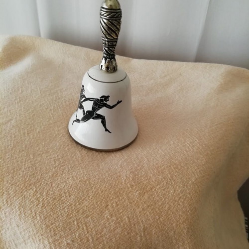 Ceramic Bell with Runners Design like new