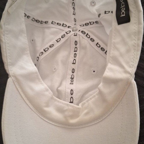 Bebe hat one size white like new