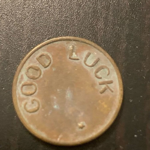 Good Luck coin used, as seen
