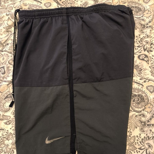 Nike running shorts size S like new, black and grey