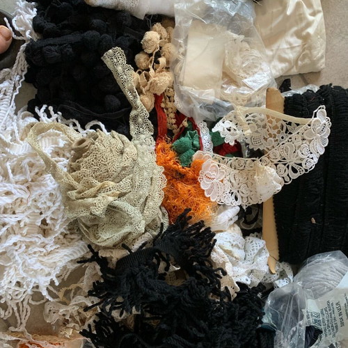Set of threads, lace and ribbons for sewing used