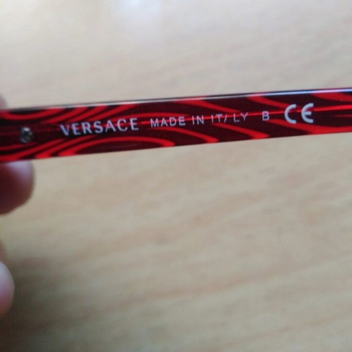 Versace women's sunglasses like new, dark burgundy frame