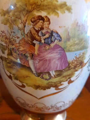 Vase used, fine porcelain with gold decoration and stamp