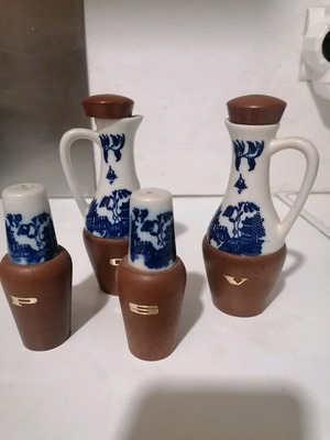 Table set used for oil, vinegar, salt and pepper made of porcelain and plastic