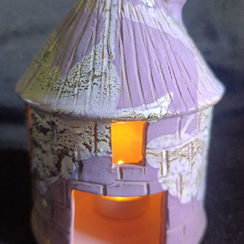 Ceramic house tealight holder used, cozy decor