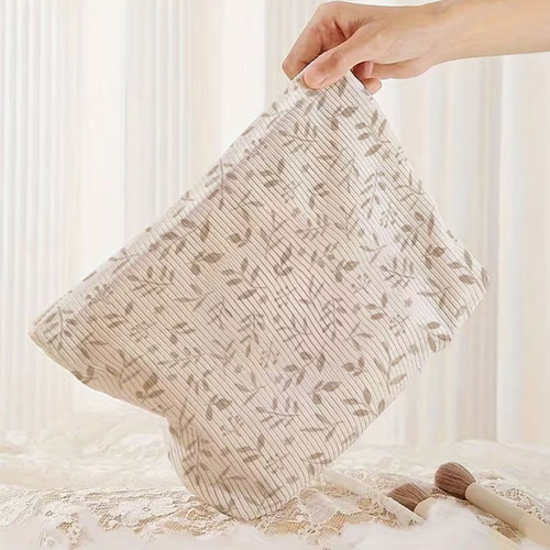 Toiletry bag new in earthy tones with botanical design