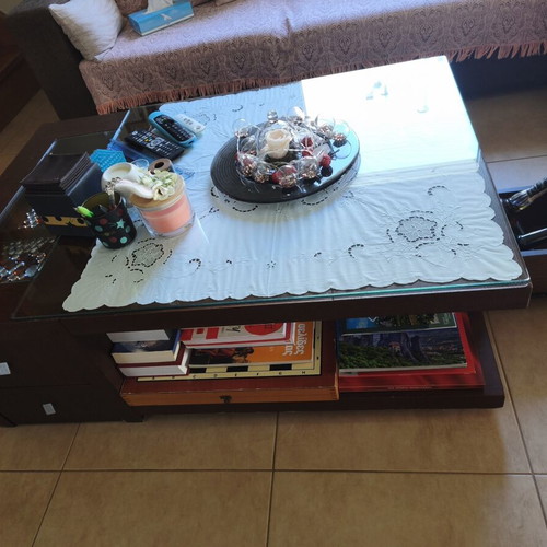 Coffee table used with four drawers and hidden compartment, wood