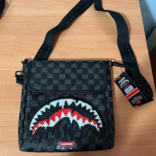 Sprayground Dripping Sharks in Paris crossbody bag brand new with tags