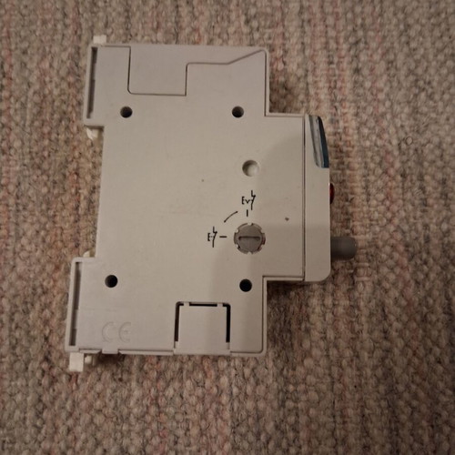 Legrand rail-mounted button switch with indicator light