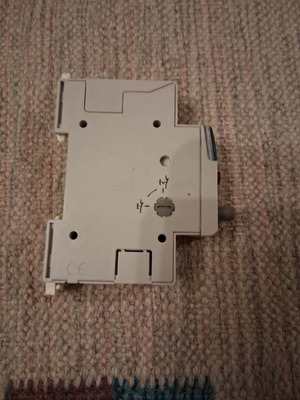 Legrand rail-mounted button switch with indicator light
