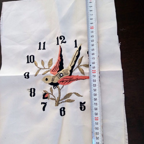 Vintage machine embroidery clock with bird on beige fabric new