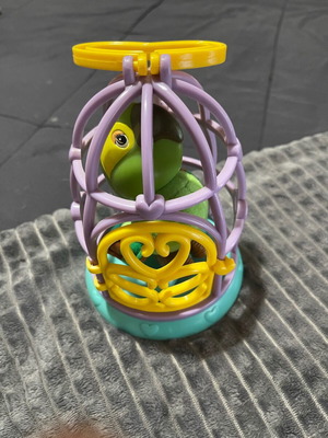 Parrot toy in cage like new