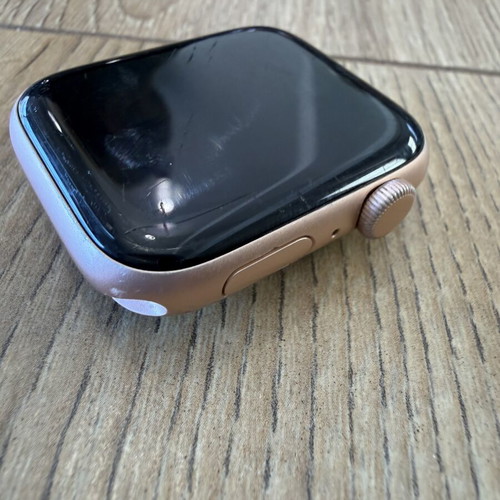 Apple Watch Series SE 44mm used, rose gold with new white strap
