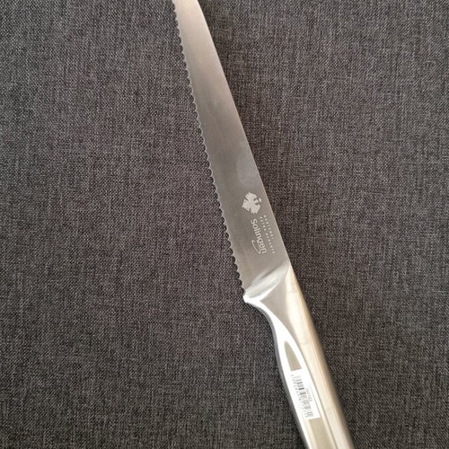 Solingen bread knife new, excellent quality