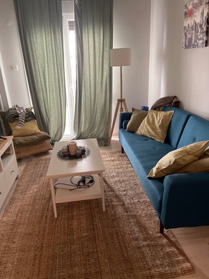 Three-seater sofa bed like new, removable arms, polyester upholstery
