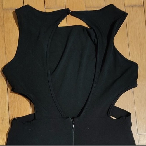Black dress with side cutouts like new, size Medium
